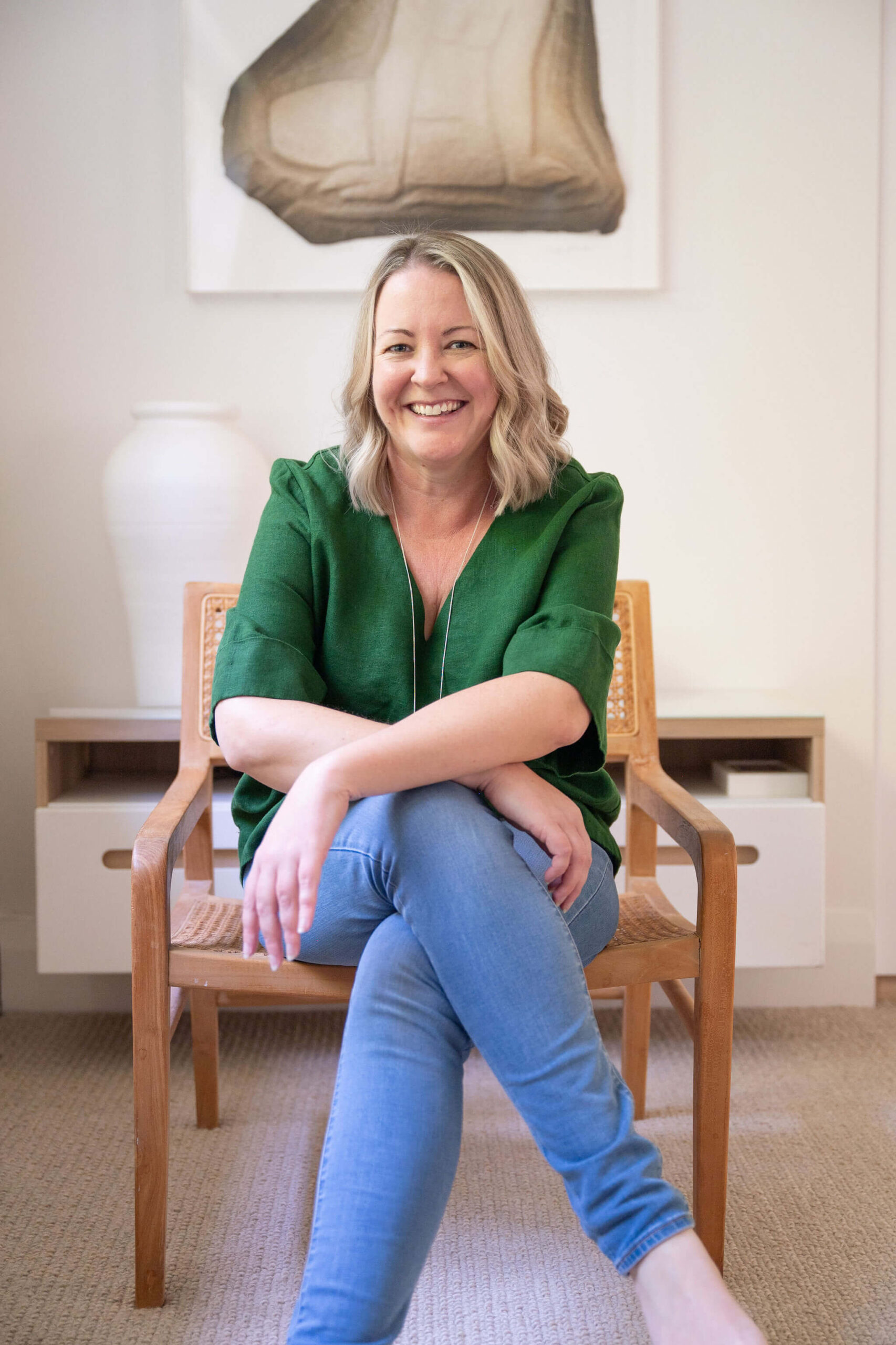 Cafe window with the words 'wake up. kick ass. be kind. reparat' written on it.